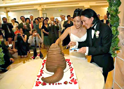Seriously what's on their wedding cake Photo Courtesy of Dlistedcom